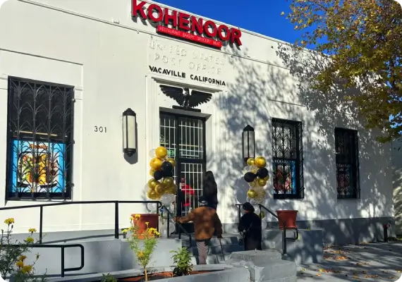 Traditional Afghan kabobs being grilled at Kohe Noor Halal Market & Restaurant